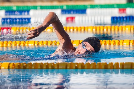 swimmer with waterproof hearing aids