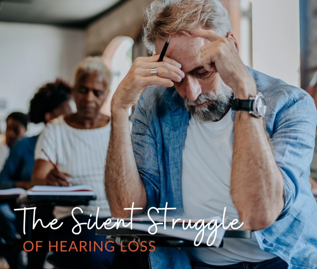 Man with head in hands-The Silent Struggle of Hearing Loss